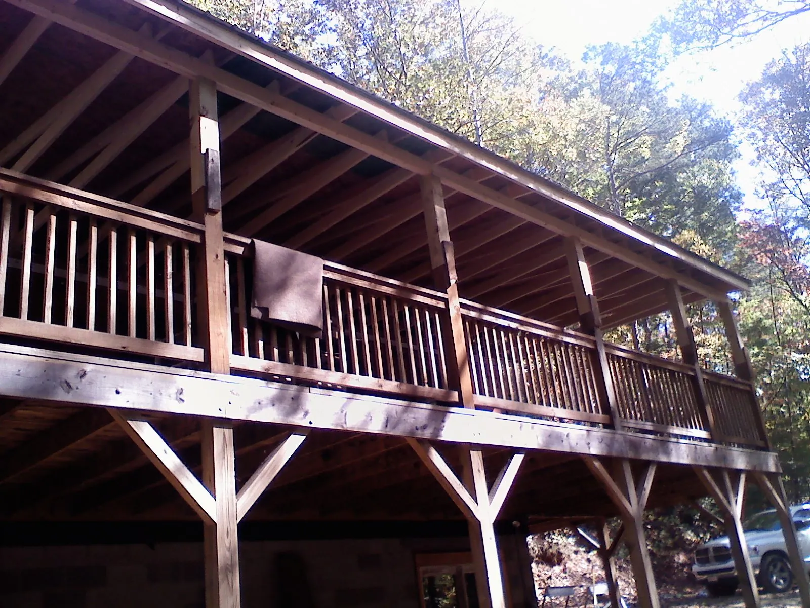 Timber framing under a new elevated porch and deck — Roof Leak Repair in Waterford Works by Roofing Brothers
